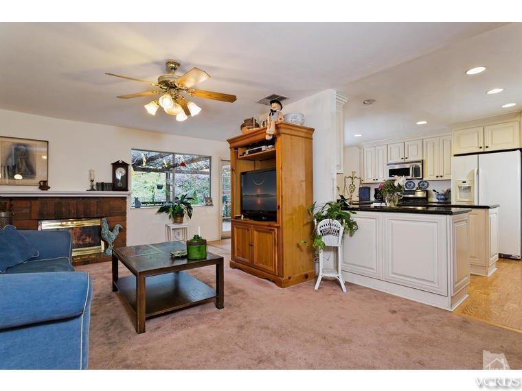 1145 Rambling Road Simi Valley, CA 93065 - Photo 12 of 30 a living room with furniture and kitchen