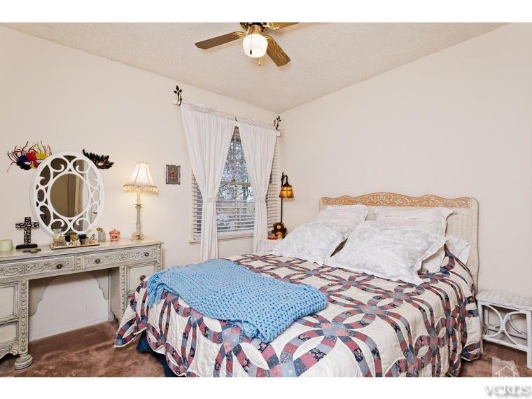 1145 Rambling Road Simi Valley, CA 93065 - Photo 17 of 30 a bedroom with a bed and a dresser