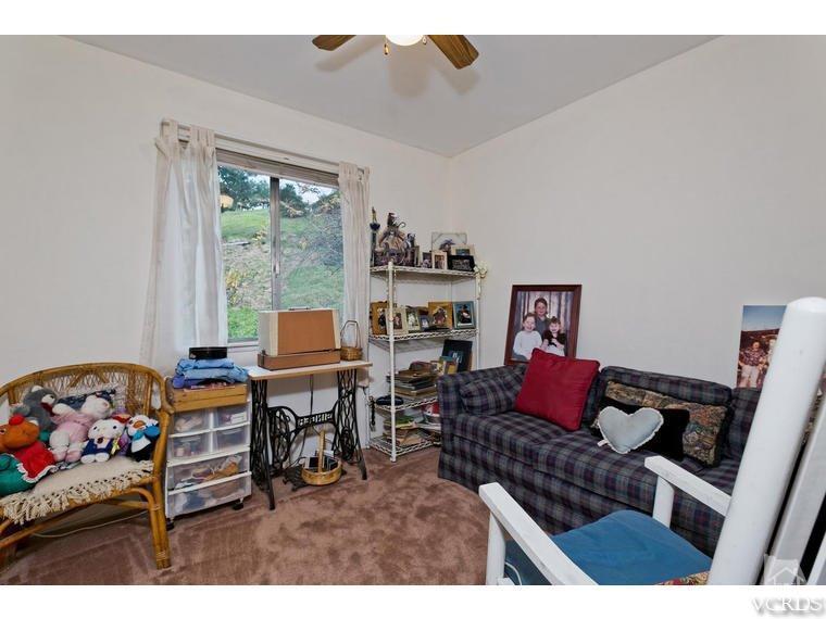 1145 Rambling Road Simi Valley, CA 93065 - Photo 19 of 30 a living room with furniture and a window