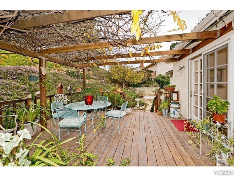1145 Rambling Road Simi Valley, CA 93065 - Photo 22 of 30 a view of a chairs and table on the terrace