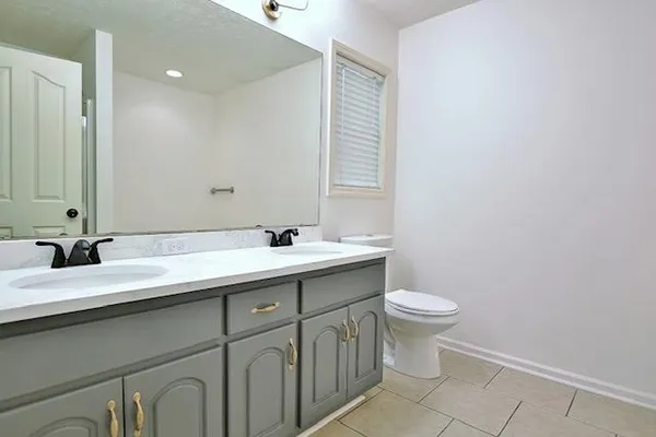 a bathroom with a sink and a toilet