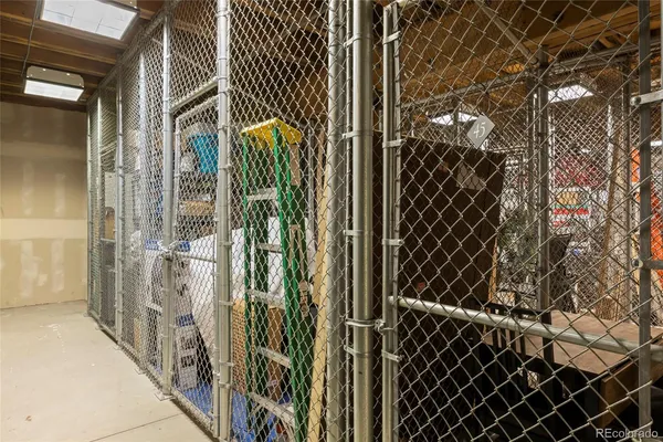 a view of a wooden door with a tree