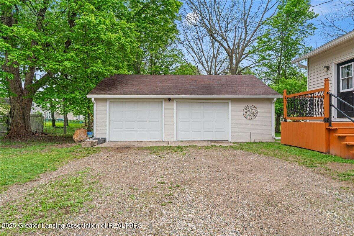 1614 Gunn Road Holt, MI 48842 - Photo 7 of 34 OVERSIZED 2 CAR GARAGE