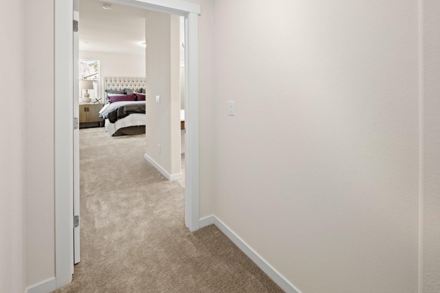 1727 Dos Rios Court Plumas Lake, CA 95961 - Photo 18 of 43 a view of hallway with livingroom and a couch