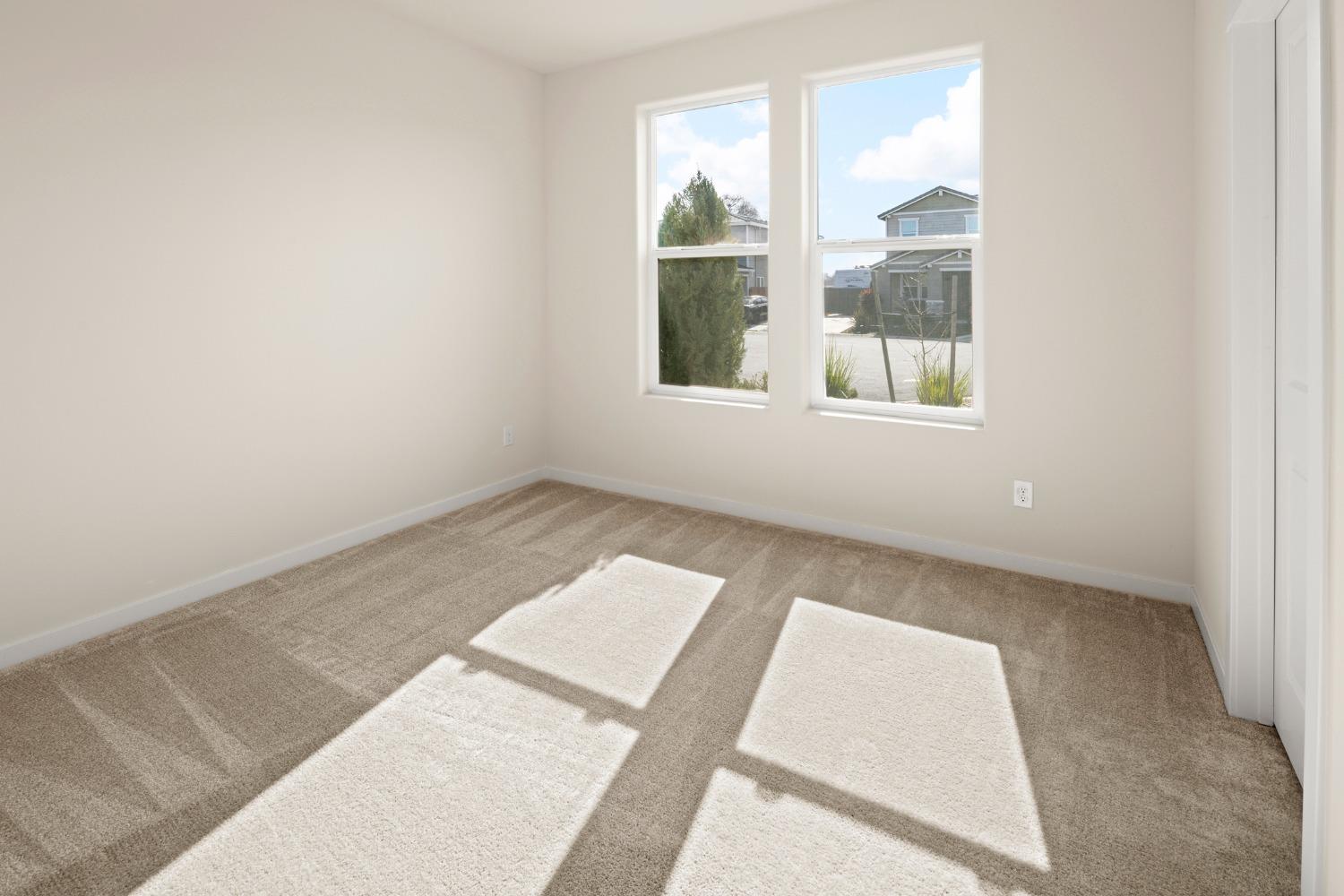 1727 Dos Rios Court Plumas Lake, CA 95961 - Photo 27 of 43 an empty room with a window
