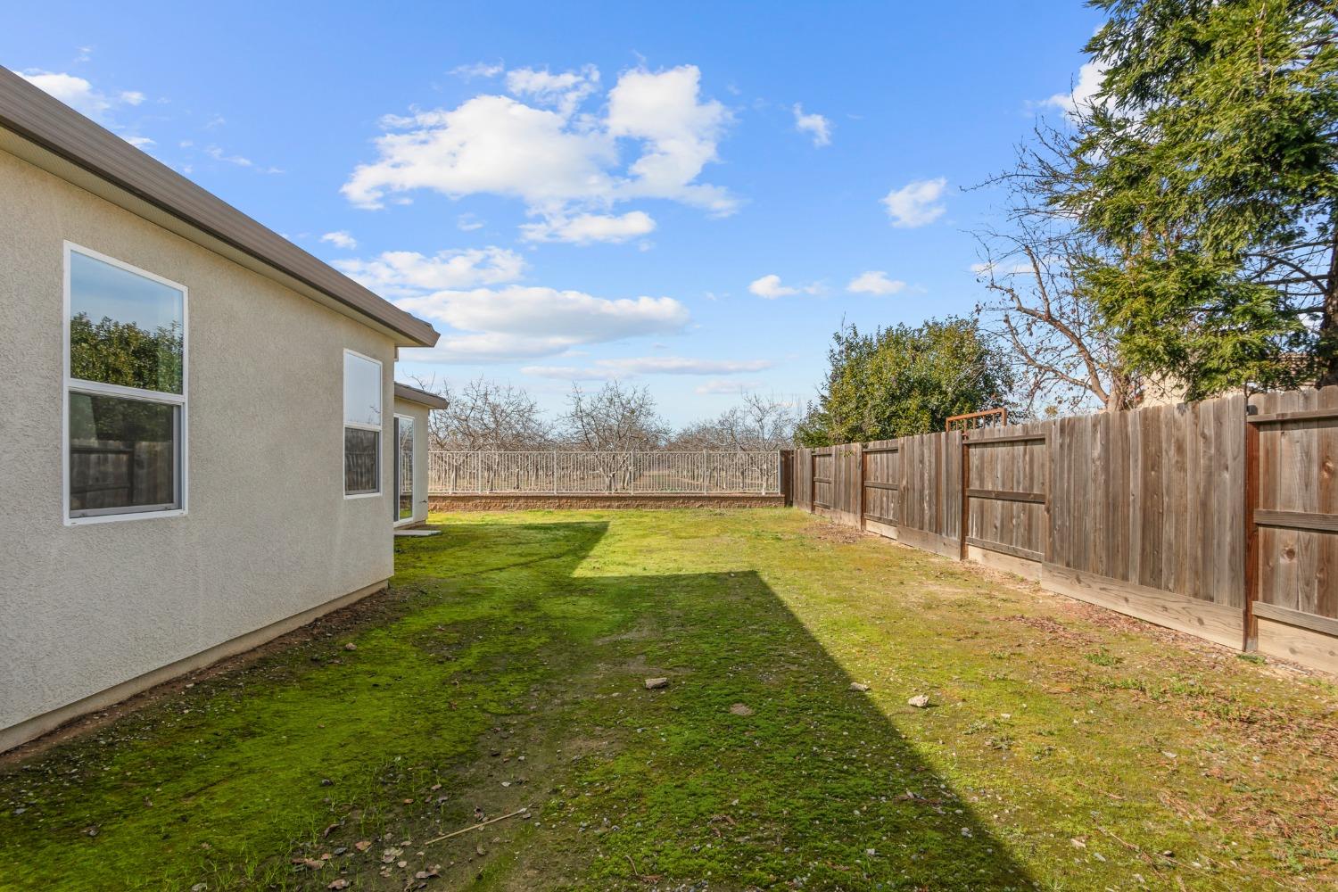 1727 Dos Rios Court Plumas Lake, CA 95961 - Photo 33 of 43 a view of swimming pool with a backyard