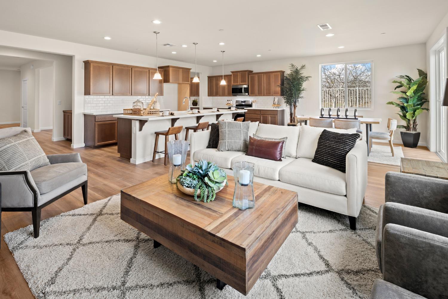 1727 Dos Rios Court Plumas Lake, CA 95961 - Photo 8 of 43 a living room with furniture kitchen and a table