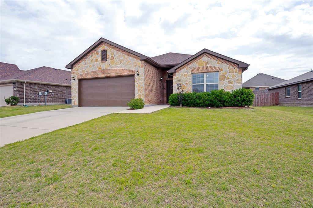 3905 Bridle Path Lane Sanger, TX 76266 - Photo 25 of 26 a front view of a house with yard and green space