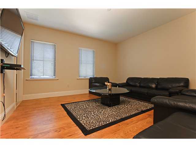 11688 Old Pump House Road Boca Raton, FL 33498 - Photo 15 of 25 a living room with furniture a rug and a window