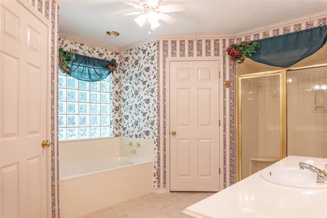 a bathroom with a sink vanity and a mirror