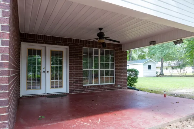 a house with trees in the background