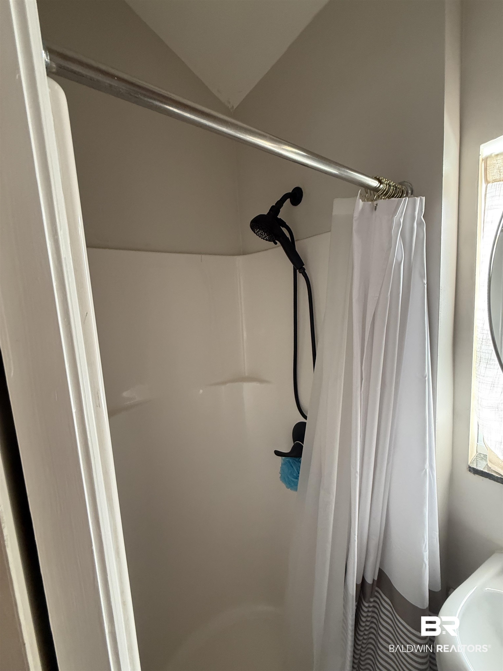28114 Preserve Trail, Unit 190 Elberta, AL 36530 - Photo 33 of 69 Full bathroom with healthy amount of natural light, a stall shower, and lofted ceiling