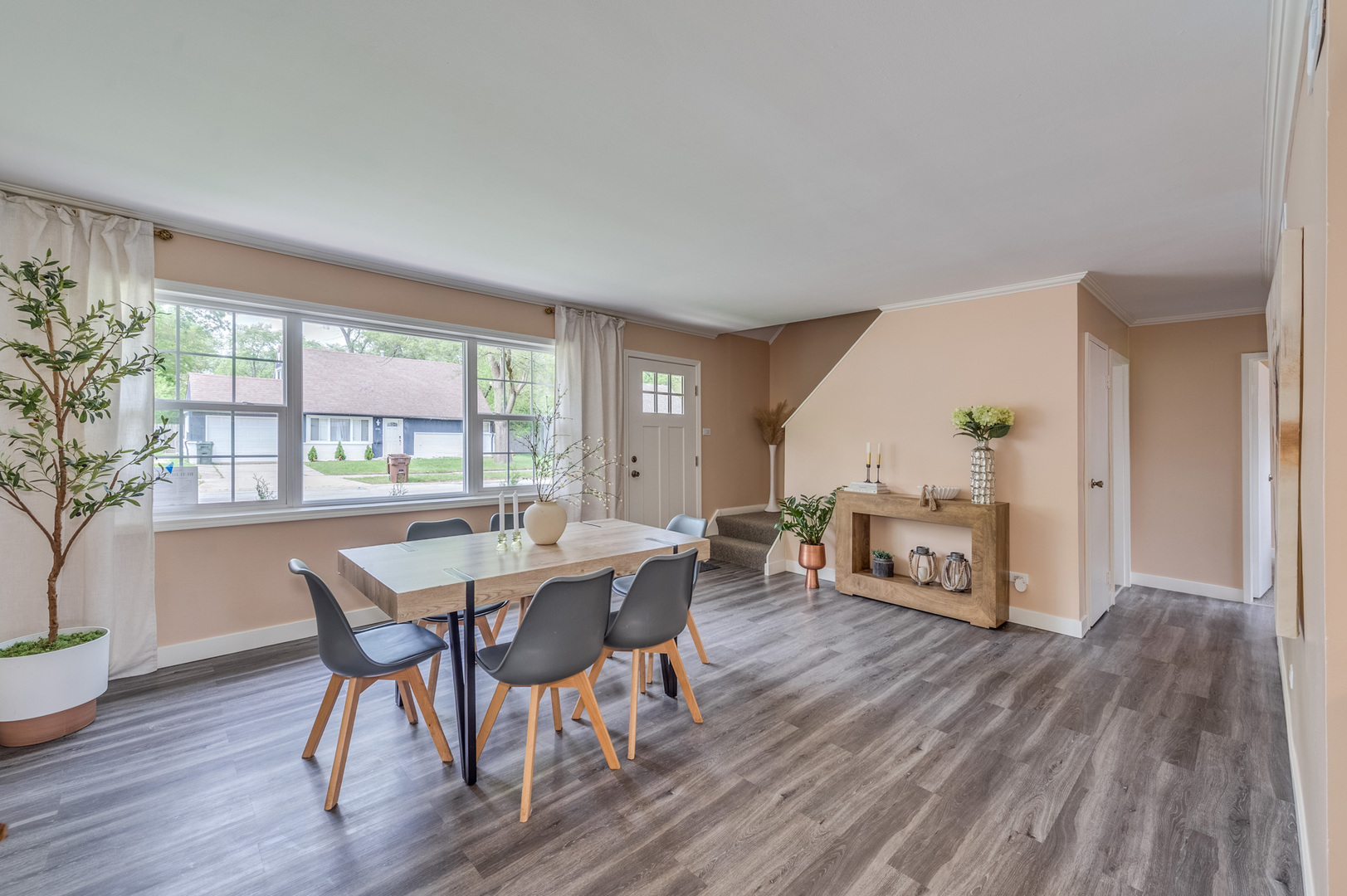 407 Watseka Street Park Forest, IL 60466 - Photo 8 of 21 a living room with furniture and a wooden floor