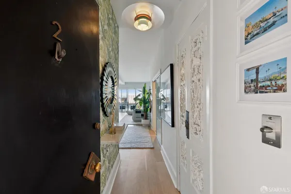 a view of a hallway with entryway