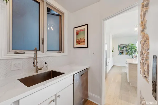 a view of a bathroom sink and mirror