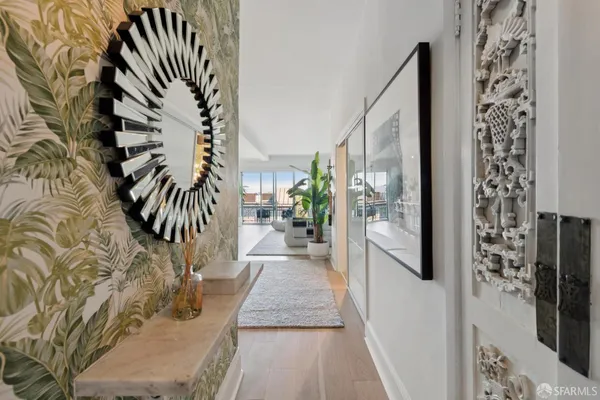 a hallway with a white stove next to a house