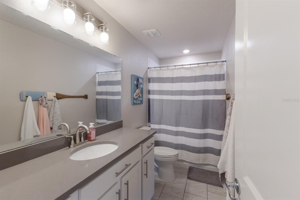 8985 Royal River Circle Parrish, FL 34219 - Photo 17 of 71 a bathroom with a sink double vanity and a mirror