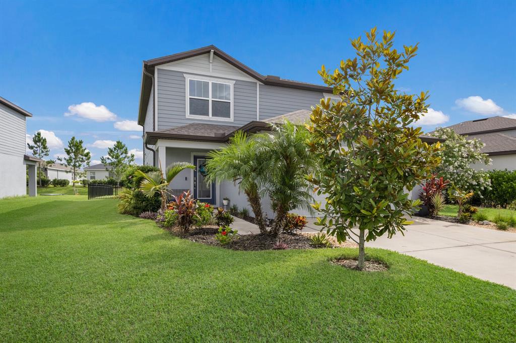 8985 Royal River Circle Parrish, FL 34219 - Photo 2 of 71 a front view of a house with a yard