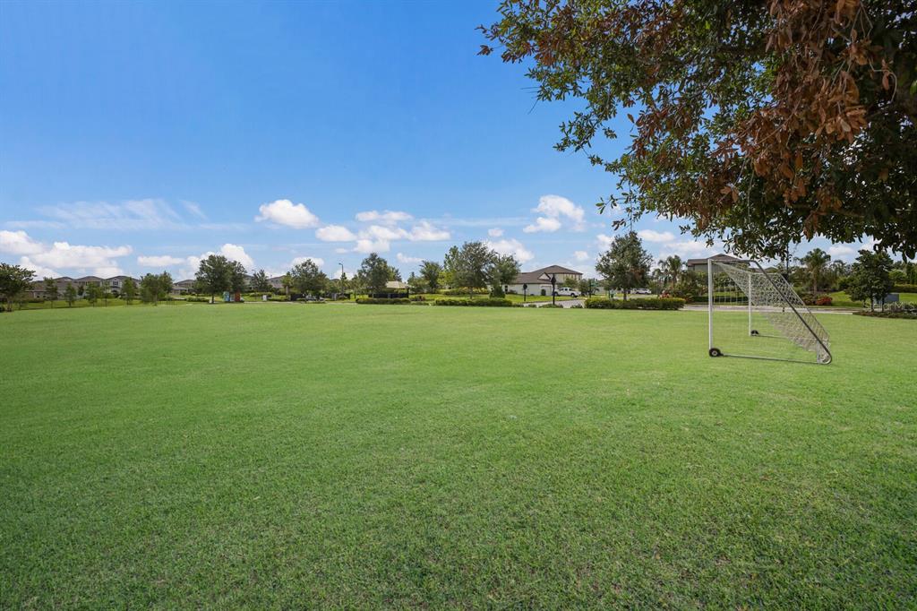 8985 Royal River Circle Parrish, FL 34219 - Photo 37 of 71 a view of a golf course with a garden