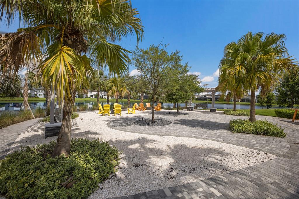 8985 Royal River Circle Parrish, FL 34219 - Photo 41 of 71 a view of road with palm trees