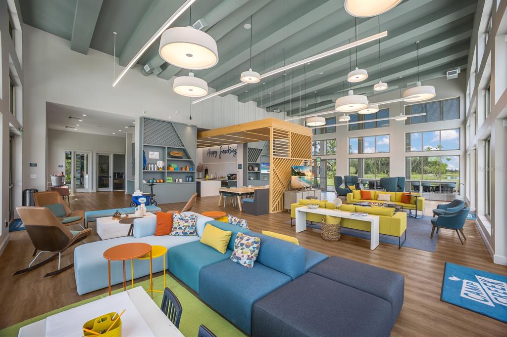 8985 Royal River Circle Parrish, FL 34219 - Photo 49 of 71 a living room with patio furniture and a large window