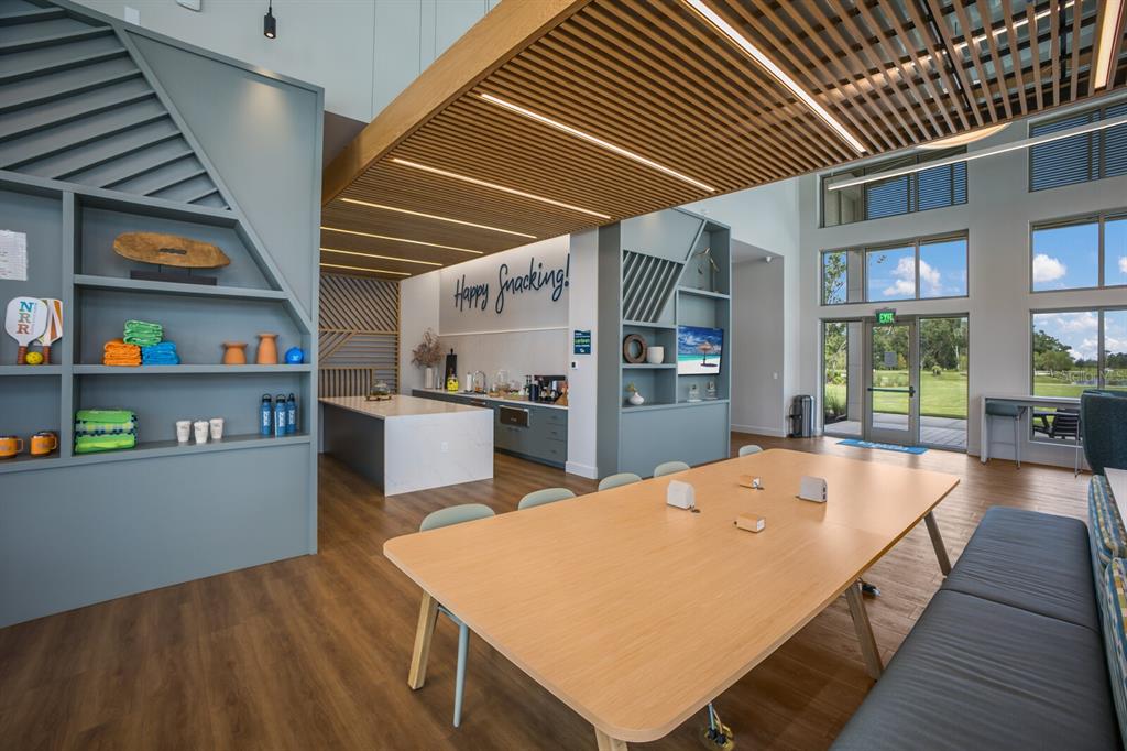 8985 Royal River Circle Parrish, FL 34219 - Photo 51 of 71 a large kitchen with stainless steel appliances granite countertop a refrigerator and stove