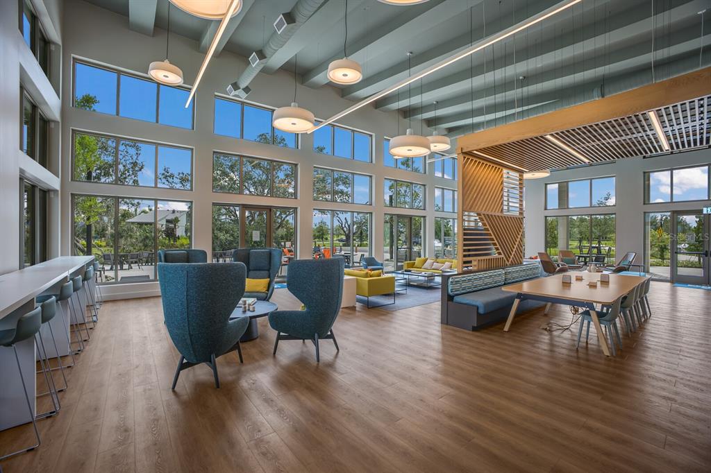 8985 Royal River Circle Parrish, FL 34219 - Photo 53 of 71 a living room with furniture and a wooden floor