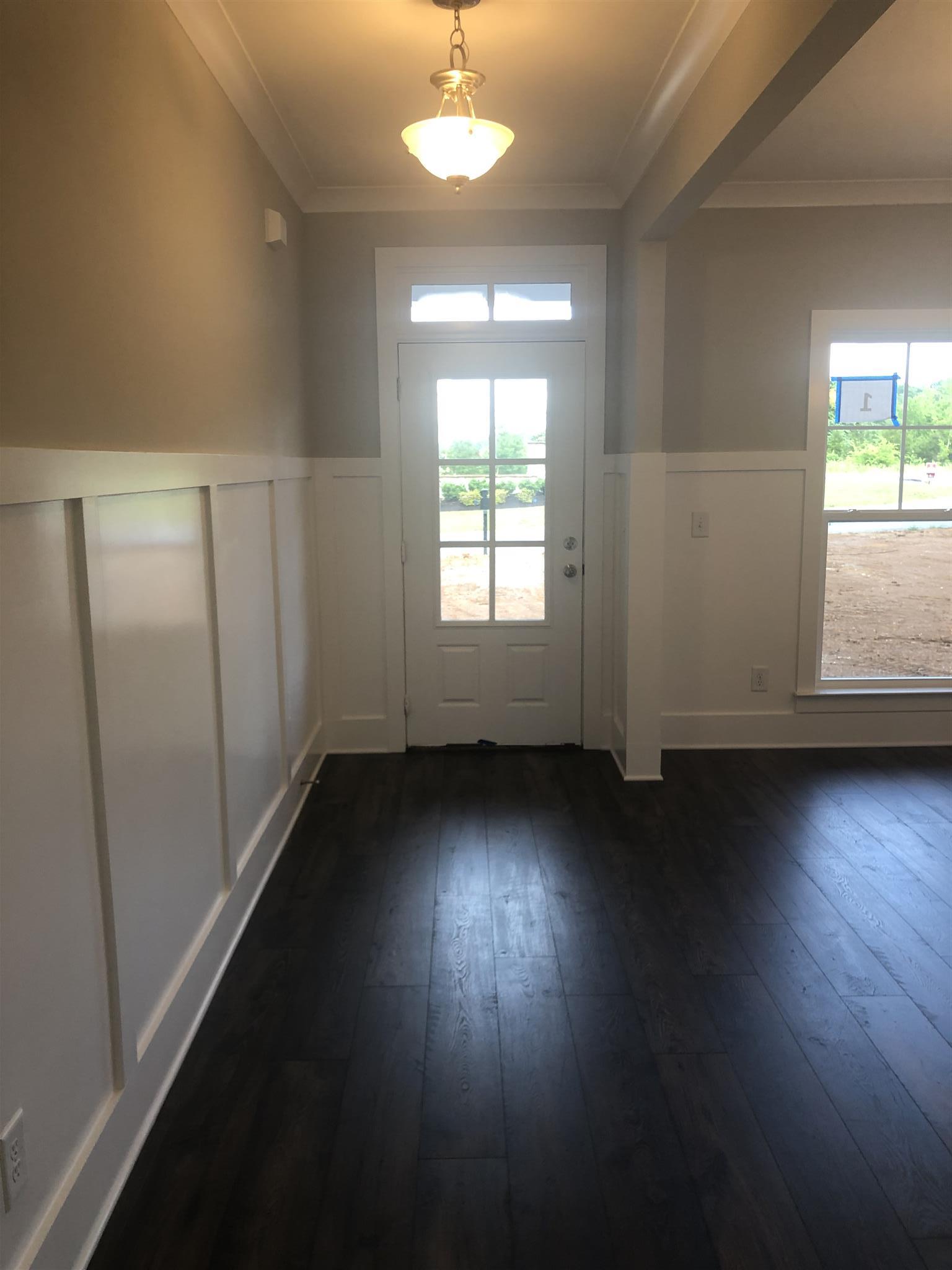 1102 Batbriar Road, Unit 1 Murfreesboro, TN 37128 - Photo 6 of 26 5 Ft Wainscot in Foyer and Dining