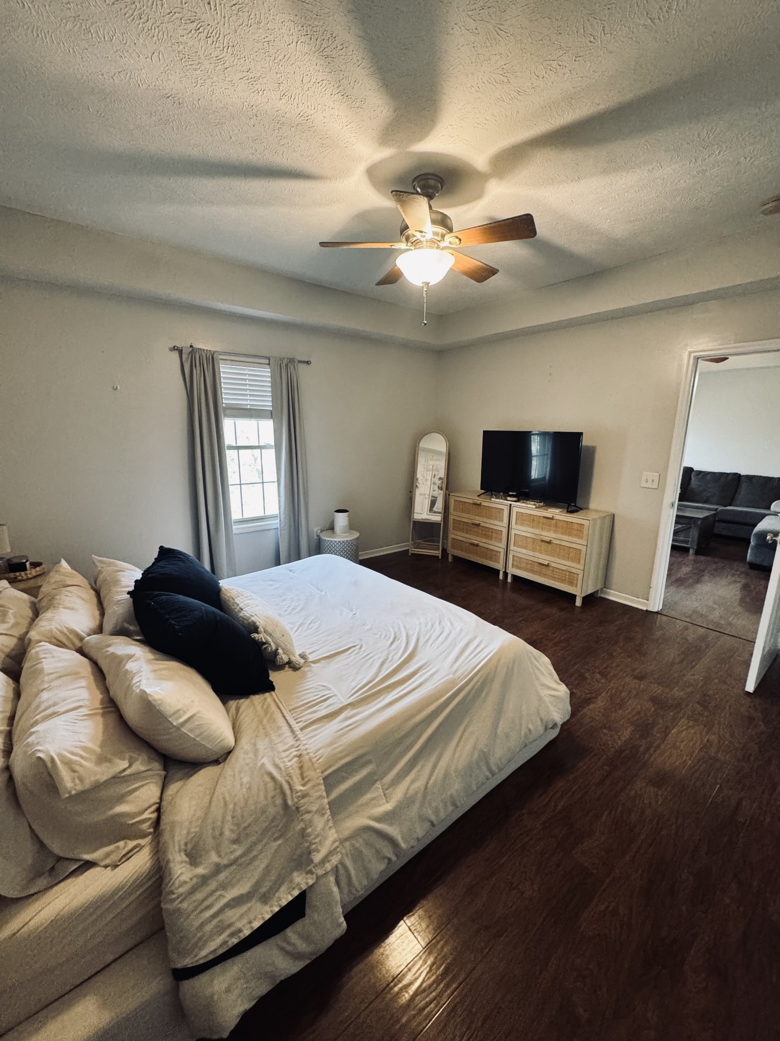 120 Skyview Drive Carthage, TN 37030 - Photo 13 of 24 a bedroom with a bed and a chandelier