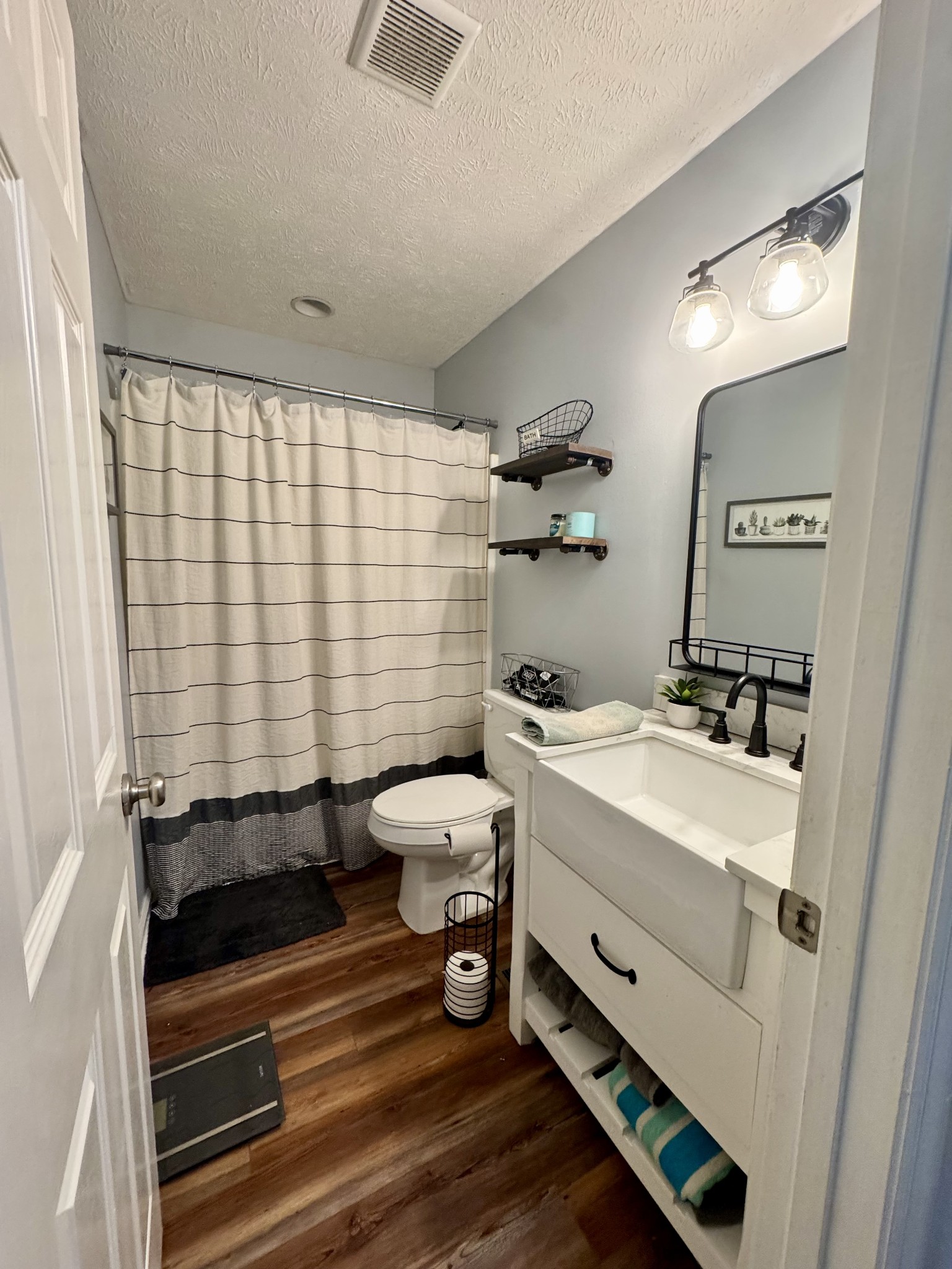 120 Skyview Drive Carthage, TN 37030 - Photo 21 of 30 a bathroom with a sink toilet and shower