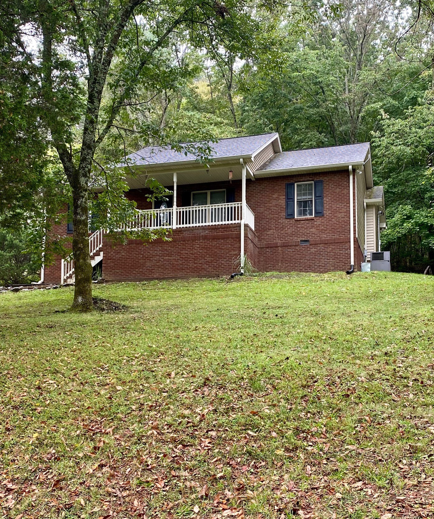 120 Skyview Drive Carthage, TN 37030 - Photo 27 of 30 a front view of a house with a garden