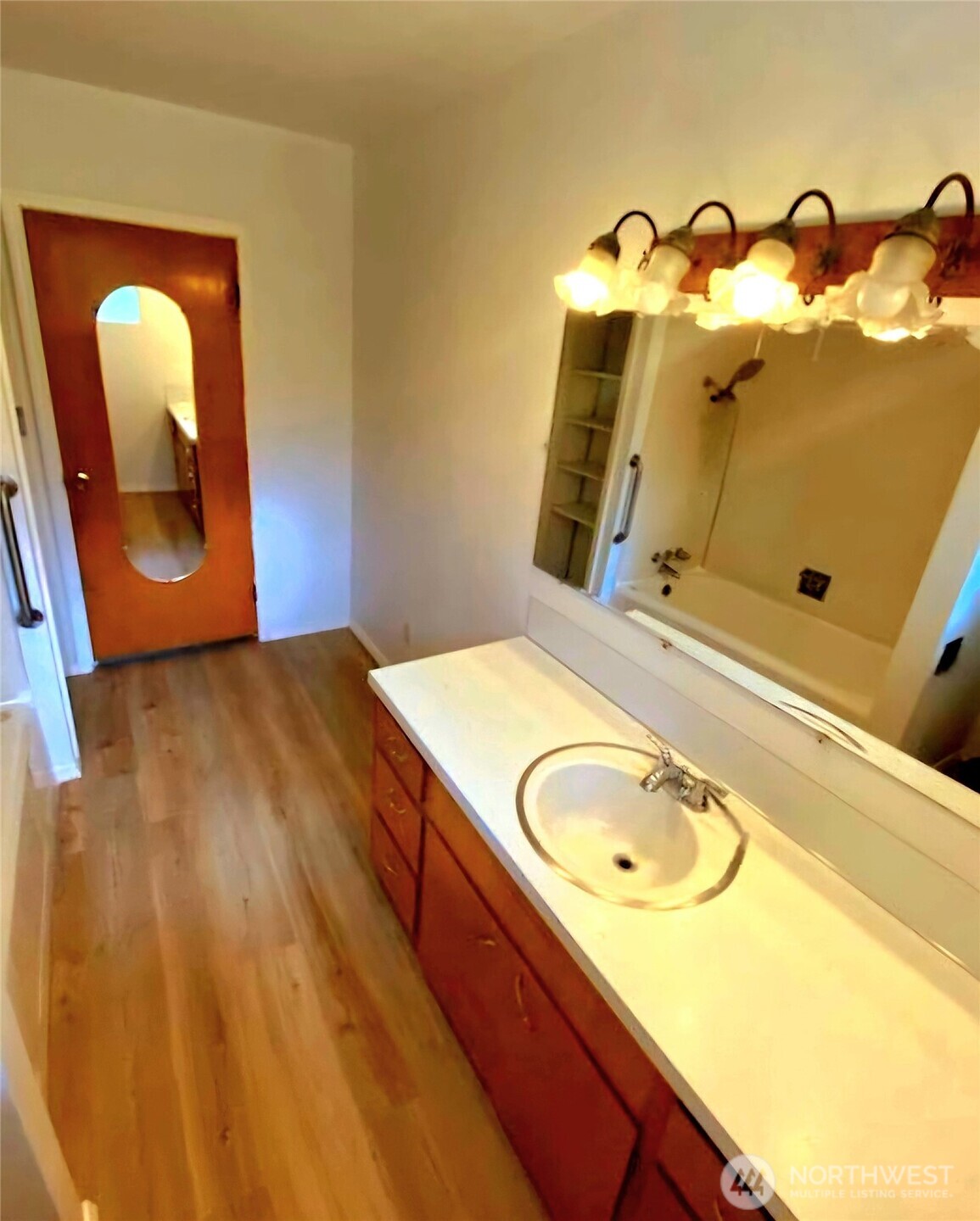 55 Church Road McCleary, WA 98557 - Photo 20 of 40 a bathroom with a sink and mirror