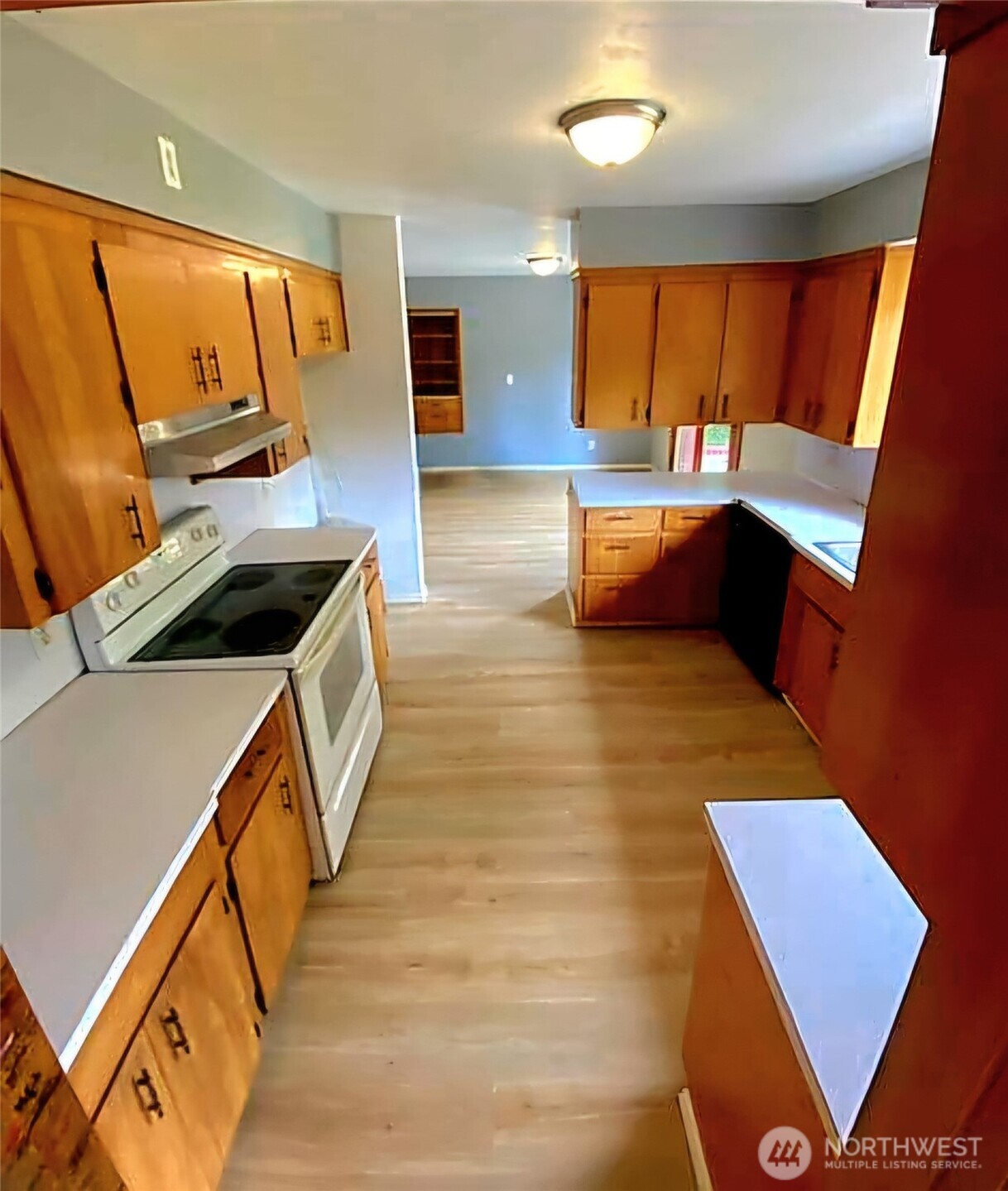 55 Church Road McCleary, WA 98557 - Photo 22 of 40 a bedroom with wooden floor and furniture