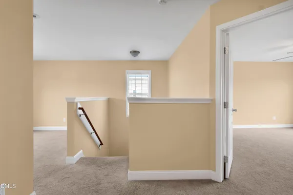 a view of a room with windows