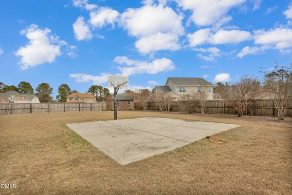 a view of an outdoor space and tennis court