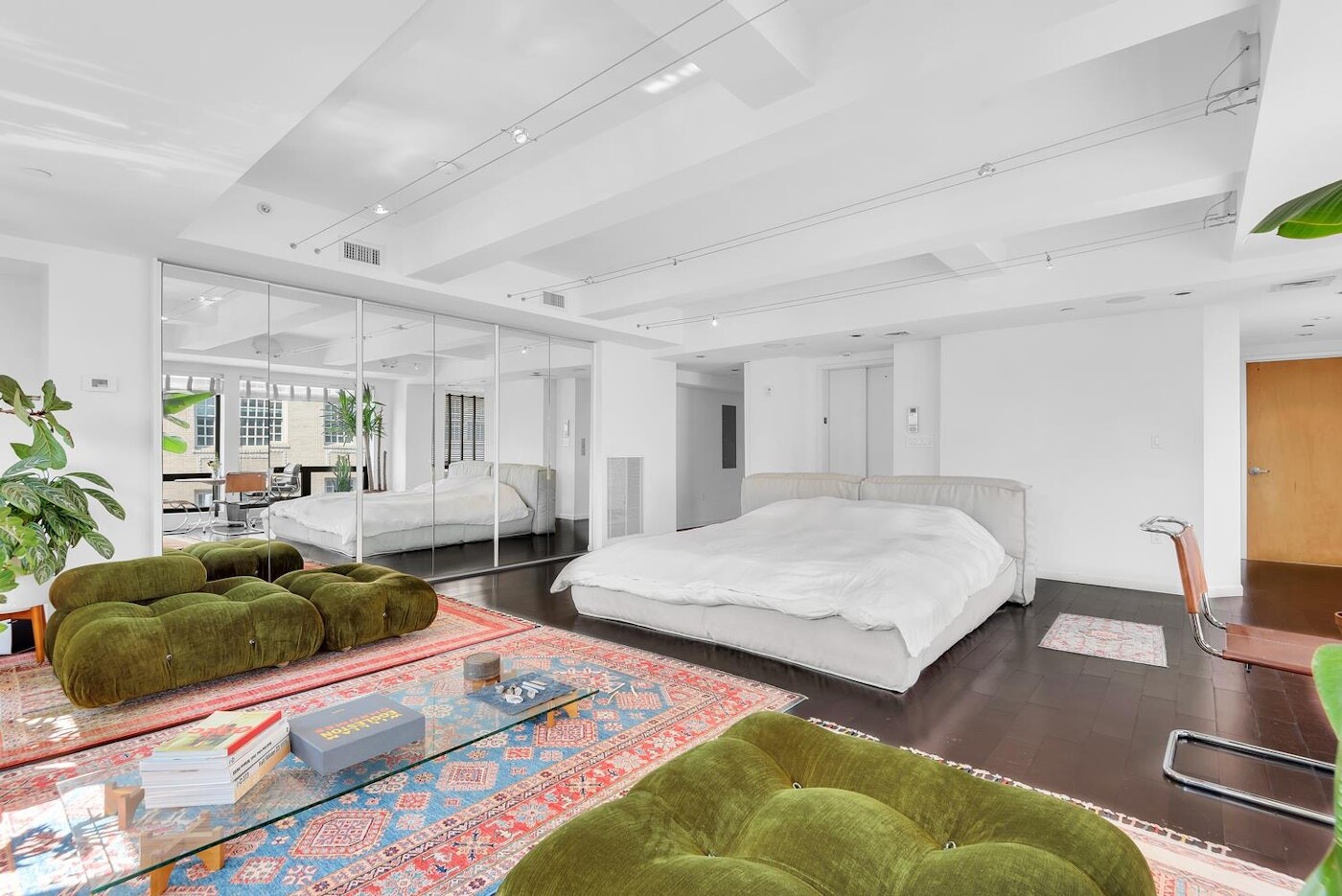 334 Grand Street, Unit PH Manhattan, NY 10002 - Photo 4 of 14 a spacious bedroom with two beds and a couch