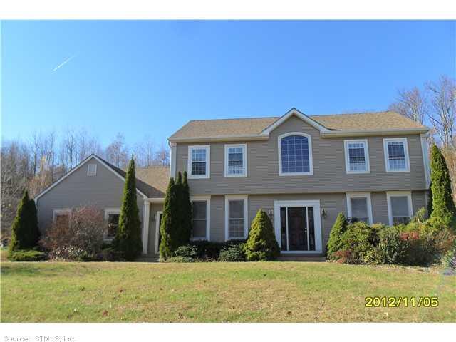 33 Dennison Ridge Drive Manchester, CT 06040 - Photo 1 of 1 a front view of a house with a yard