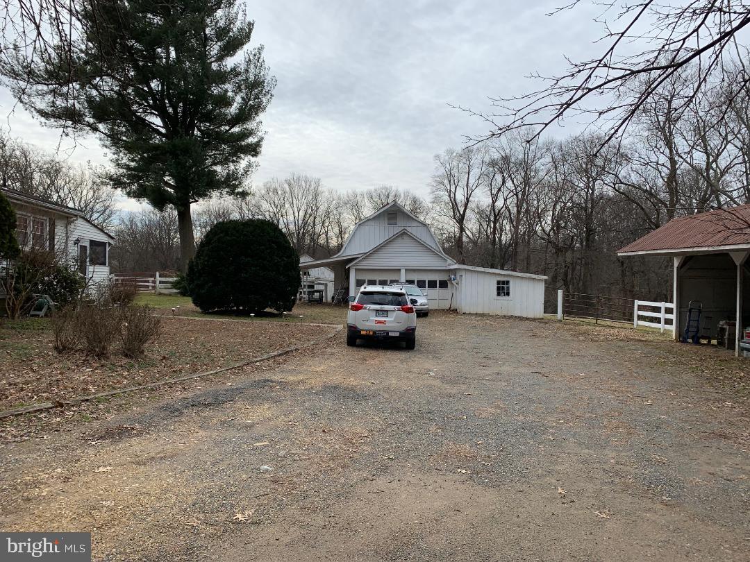 2190 Hunter Mill Road Vienna, VA 22181 - Photo 2 of 20 DRIVEWAY WITH DOORED TWO CAR GARAGE