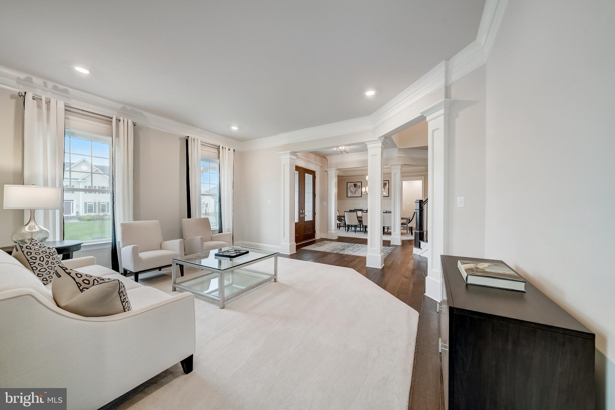 6 Gershwin Drive West Chester, PA 19380 - Photo 16 of 79 a living room with furniture and a large window