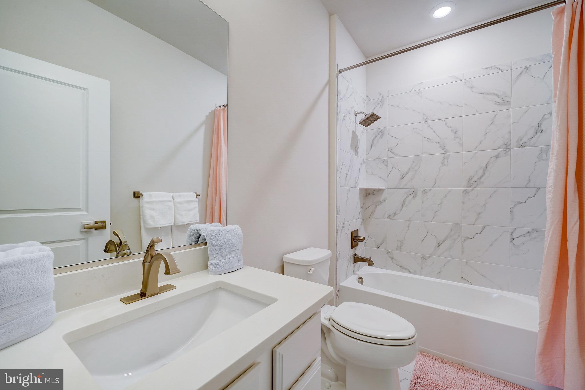 6 Gershwin Drive West Chester, PA 19380 - Photo 52 of 79 a bathroom with a sink toilet and shower