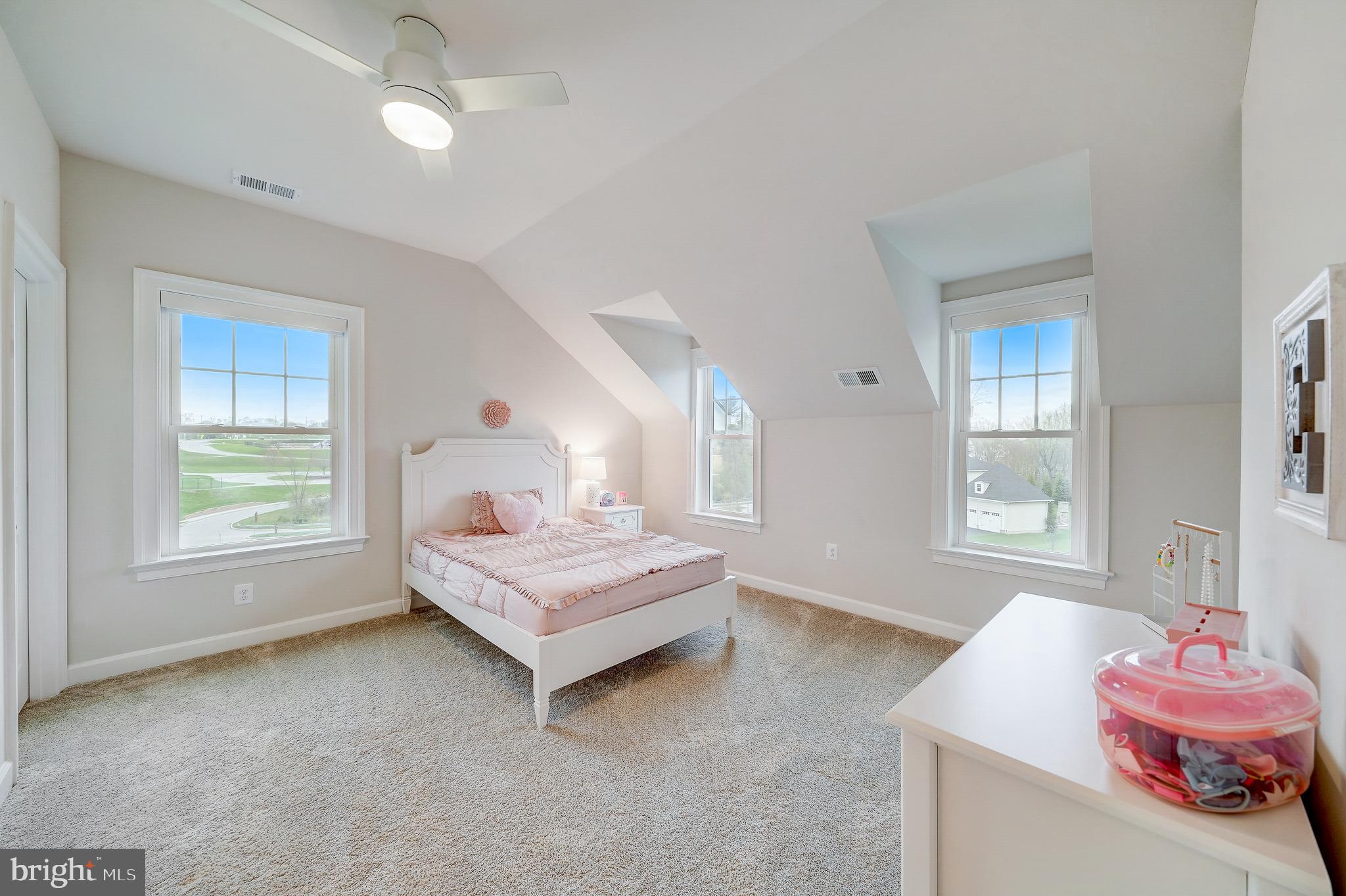 6 Gershwin Drive West Chester, PA 19380 - Photo 53 of 79 a spacious bedroom with a bed window and table