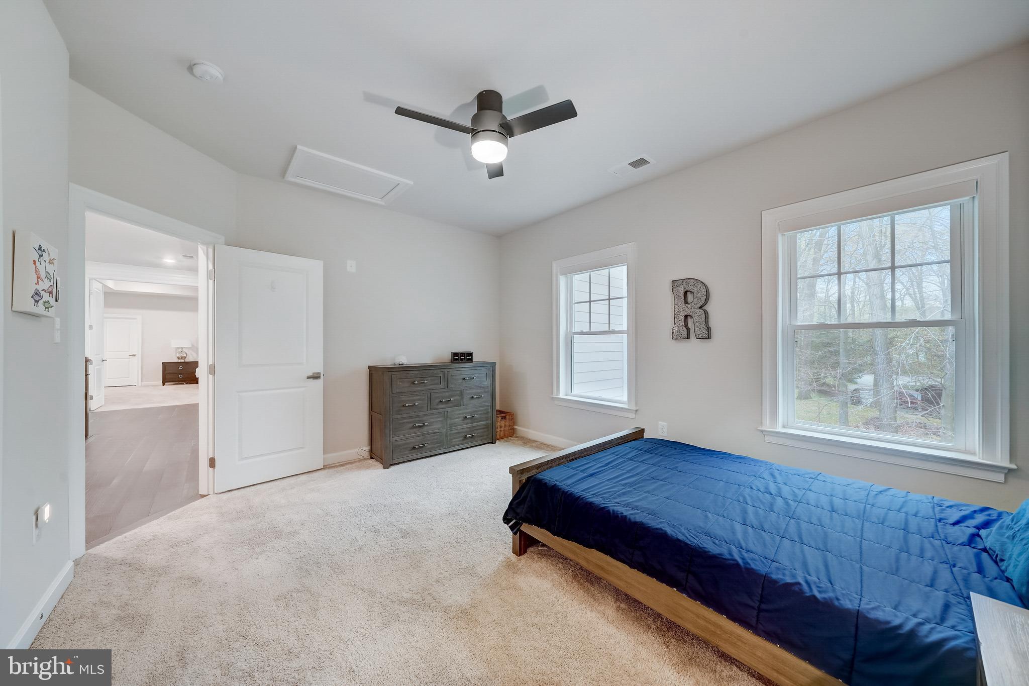 6 Gershwin Drive West Chester, PA 19380 - Photo 57 of 79 a living room with a bed furniture and next to a window