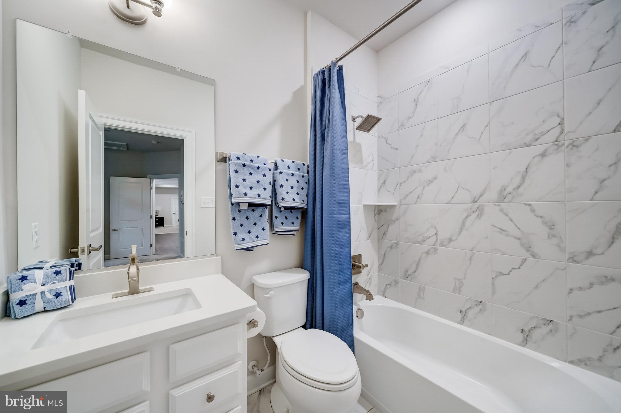 6 Gershwin Drive West Chester, PA 19380 - Photo 58 of 79 a bathroom with a sink a toilet and a bathtub