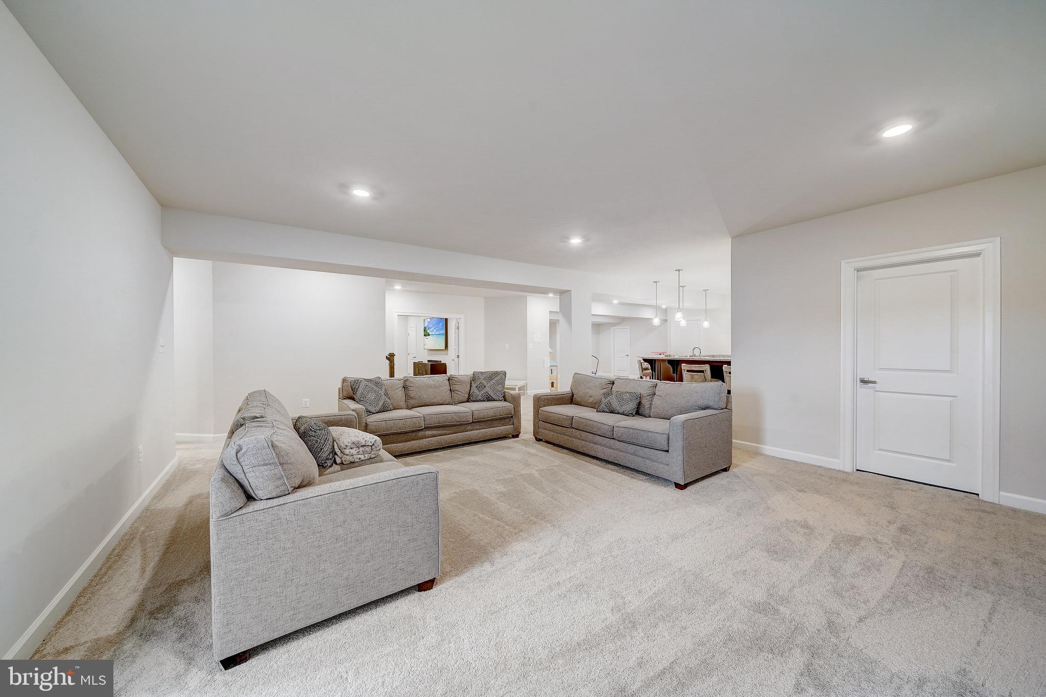 6 Gershwin Drive West Chester, PA 19380 - Photo 61 of 79 a living room with furniture and white walls