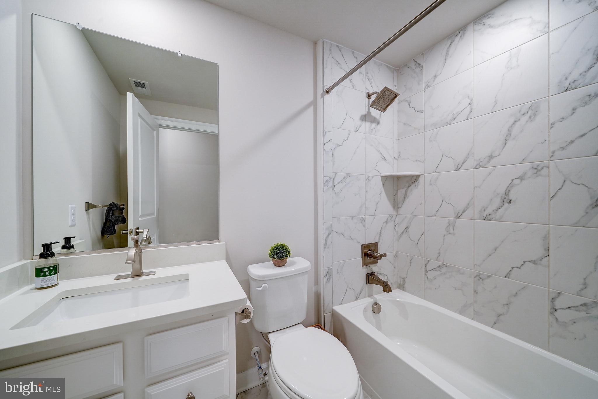 6 Gershwin Drive West Chester, PA 19380 - Photo 70 of 79 a bathroom with a sink a toilet and shower