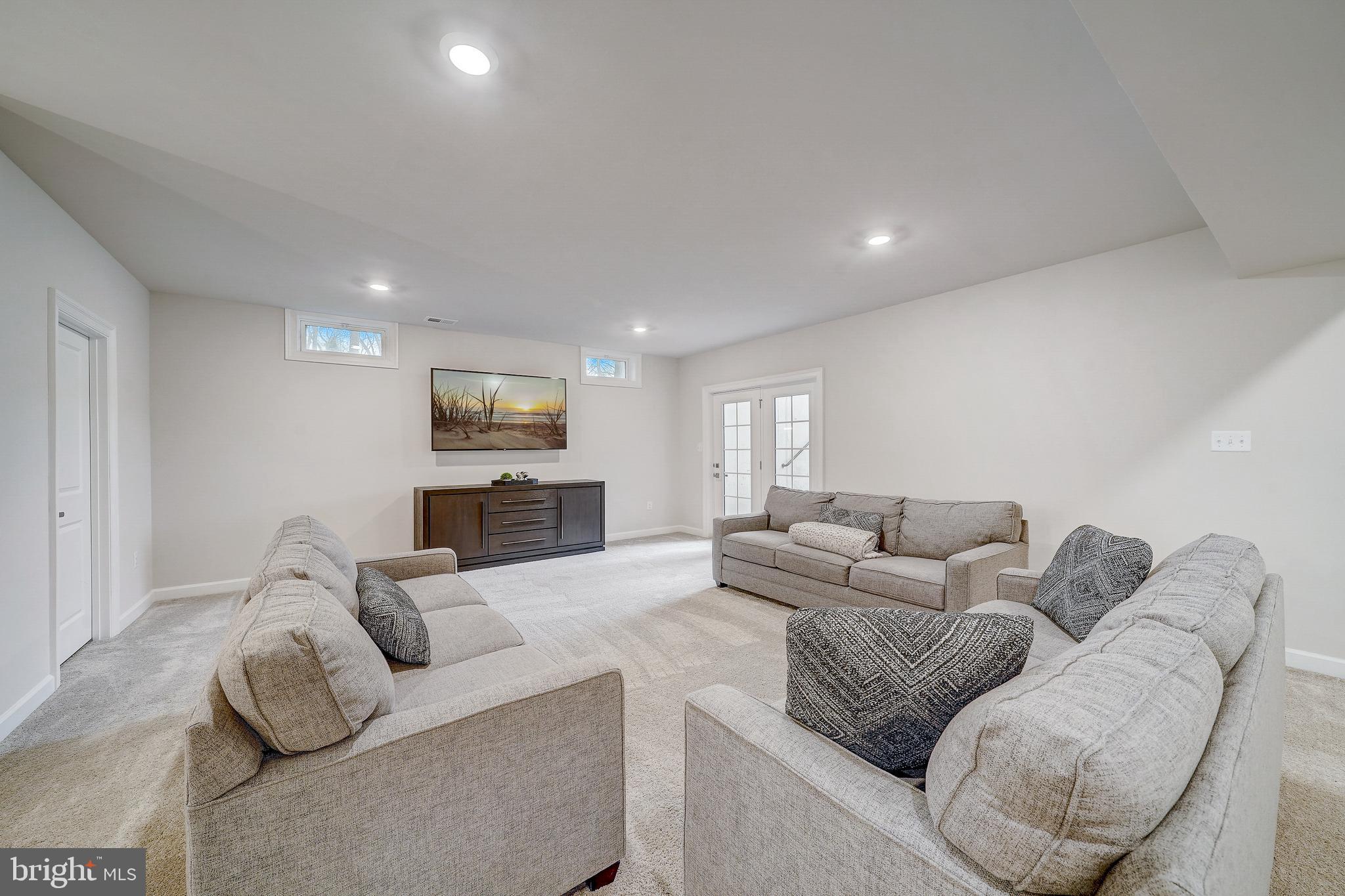 6 Gershwin Drive West Chester, PA 19380 - Photo 73 of 79 a living room with furniture and a flat screen tv