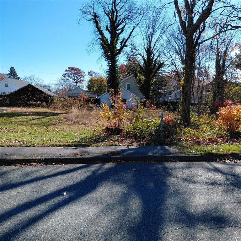 3.5 Golf Street Fairhaven, MA 02719 - Photo 2 of 10 a front view of a house with a yard