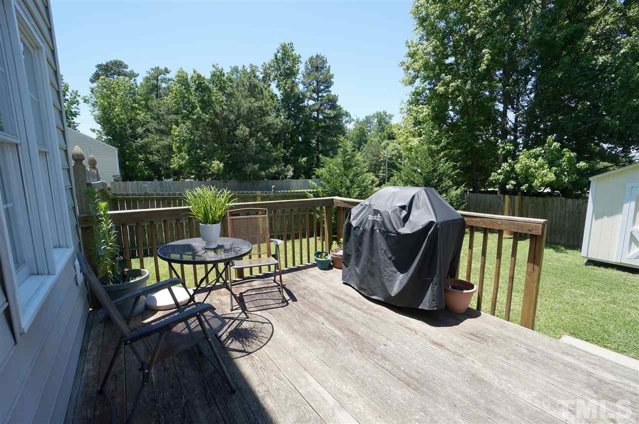 5401 Spring Pines Way Raleigh, NC 27616 - Photo 13 of 16 a view of a chairs and table in the patio