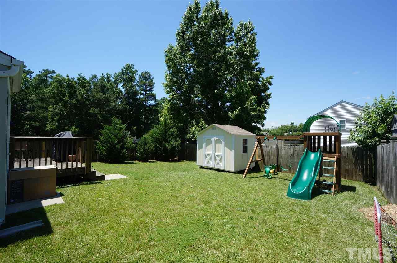 5401 Spring Pines Way Raleigh, NC 27616 - Photo 14 of 16 a view of a park with slide