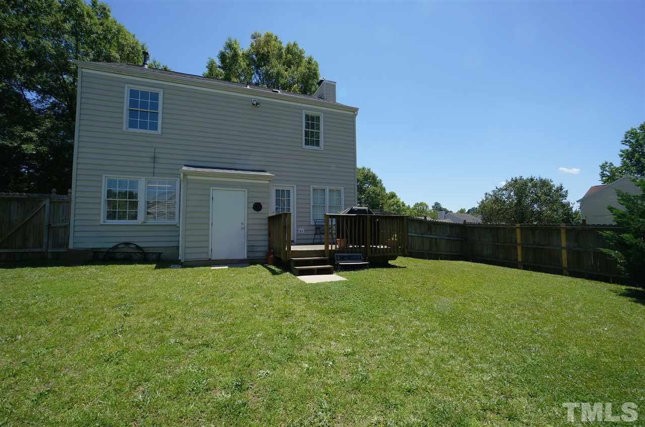 5401 Spring Pines Way Raleigh, NC 27616 - Photo 15 of 16 a view of a backyard with a garden and stairs